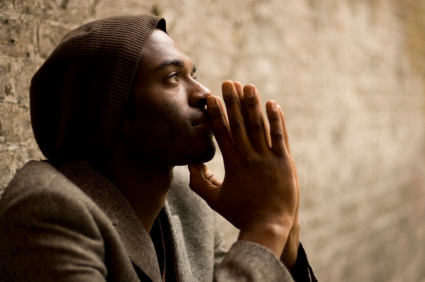 Young-African-man-in-contemplation-iStock_000006274190XSmall